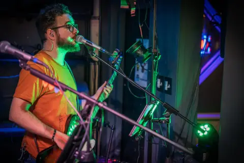Bass guitarist singing